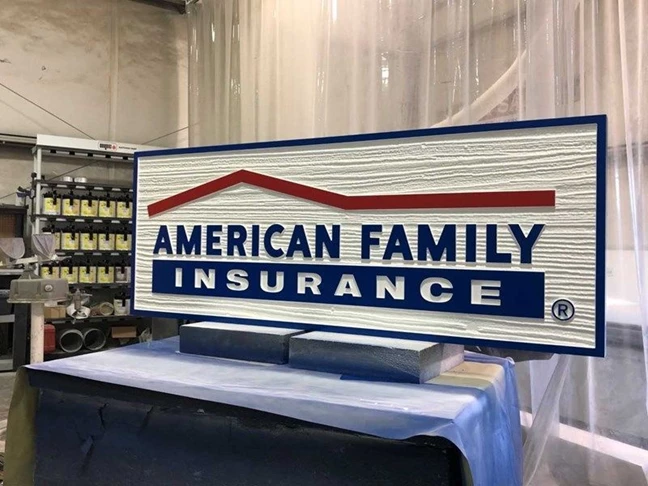 Red, White, and Blue Insurance Sign