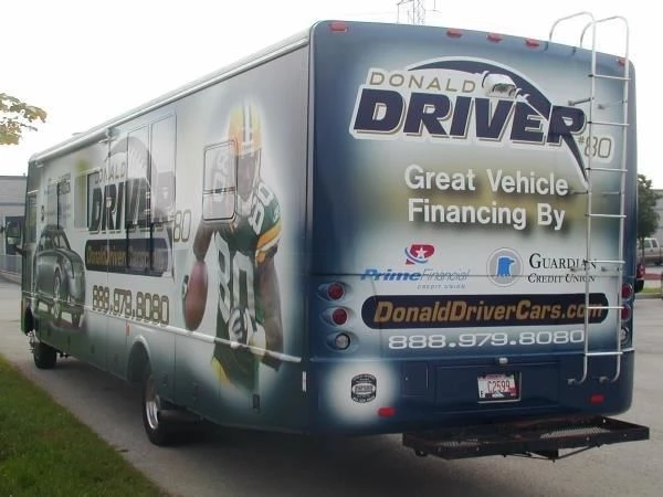 Vehicle Financing Wrap on Bus with Photos and Text; View from Back