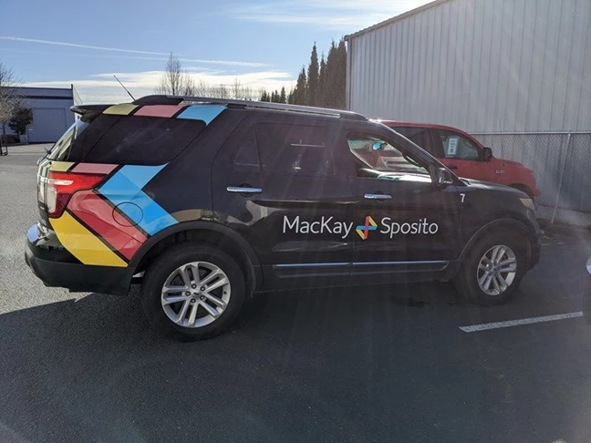 Colorful Vehicle Wrap with Logo