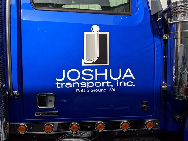 Vehicle Graphic with Logo and Lettering