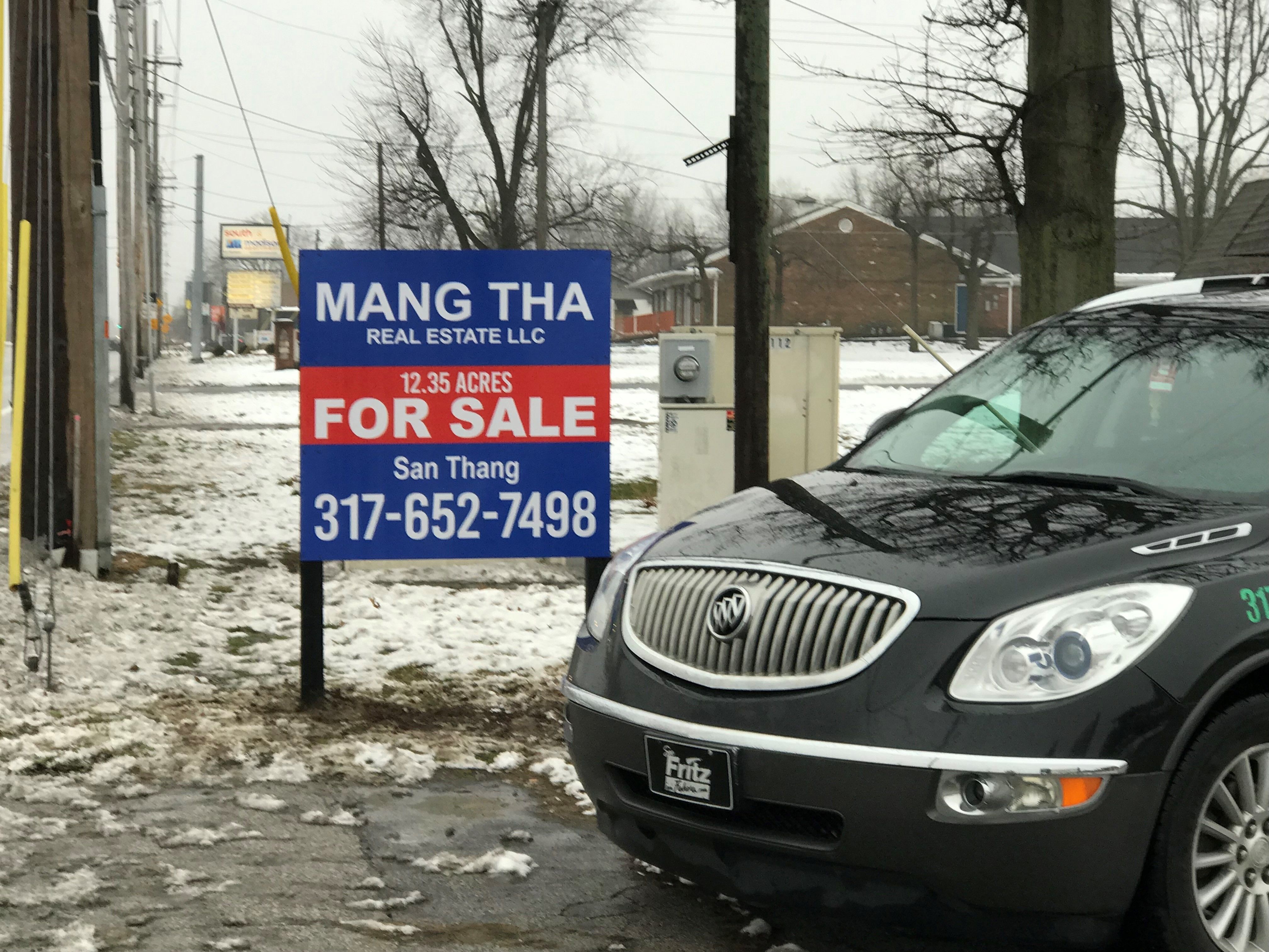 Post and Panel Sign for Mang Tha Real Estate in Indianapolis IN