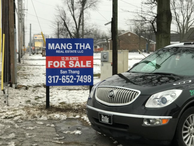 Post and Panel Sign for Mang Tha Real Estate in Indianapolis IN