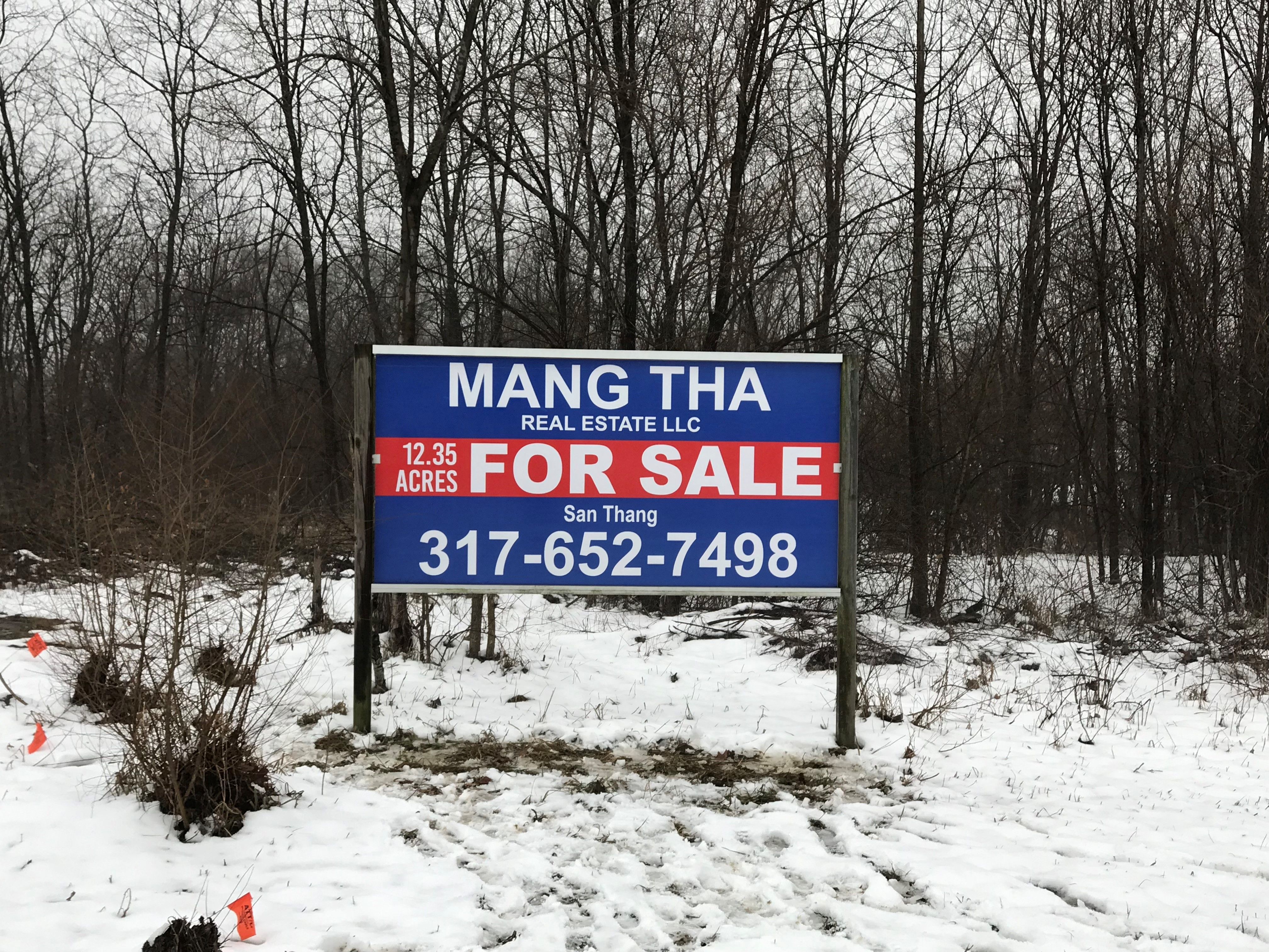 Post and Panel Sign for Mang Tha Real Estate in Indianapolis IN