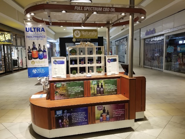 Mall Kiosk Graphics for Zilis CBD Oil in Greenwood Park Mall in Greenwood, IN