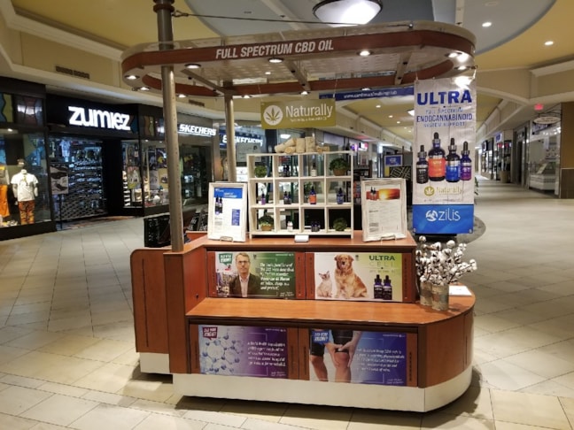 Mall Kiosk Graphics for Zilis CBD Oil in Greenwood Park Mall in Greenwood, IN