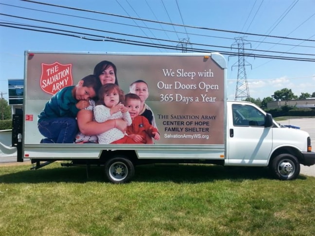 Full wrap for the sides and back of their box truck.  On this one, both sides are different.