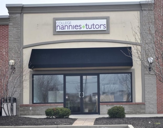 Helping light the way to businesses that lighten your load!  (Lighted Acrylic Panel Sign by Signs Now Cincinnati for College Nannies & Tutors, Mason, OH)