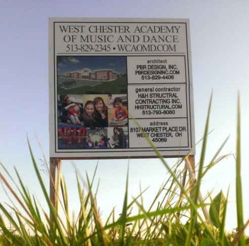New development?  Share the news with custom post and panel signs!  (Custom Post and Panel Sign by Signs Now Cincinnati for West Chester Academy of Music & Dance, West Chester, OH)