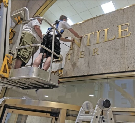 Dimensional Letters Being Installed at The Mercantile