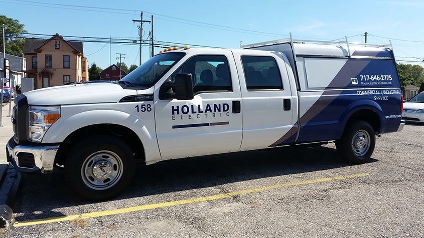 Signs Now Hanover has designed and installed a number of partial vehicle wraps for Holland Electric.