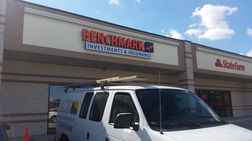 Lighted channel on a raceway for Benchmark Investments