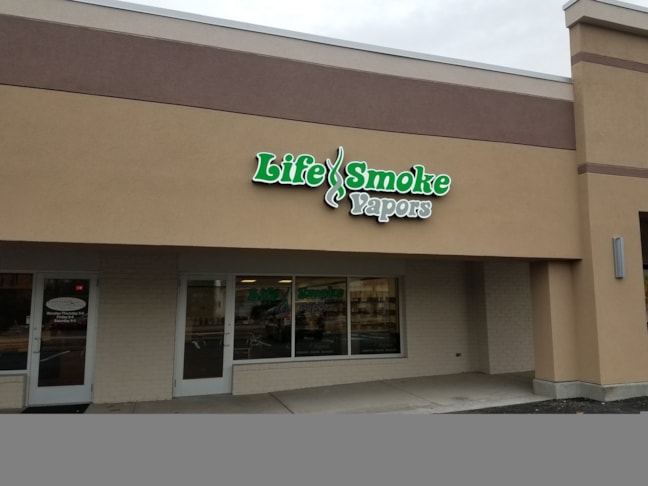 Lighted channel letter sign for Life Smoke Vapors
