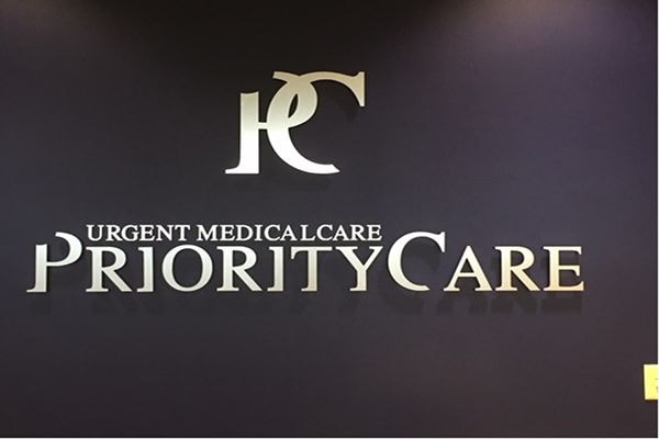 Interior dimensional logo sign for Priority Care in Baltimore, MD