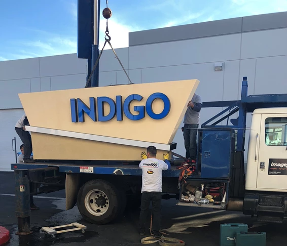 Heading to the installation of the Indigo Monument Sign 