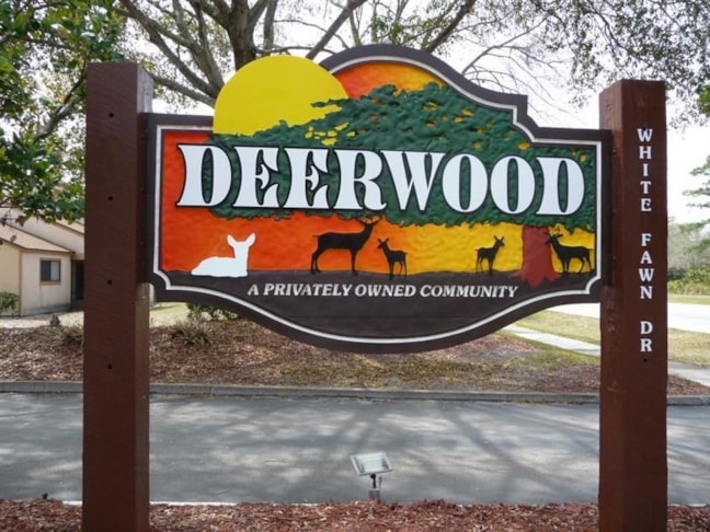 Carved Panel sign mounted on Post