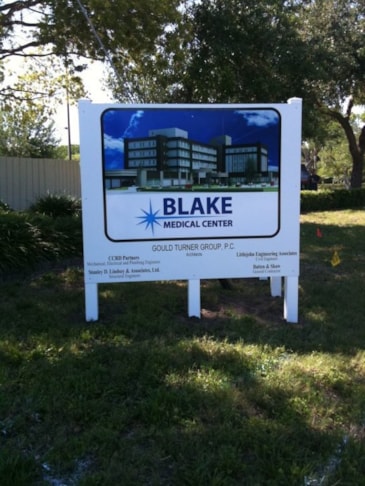 Post and panel signage complete with custom logo and lettering