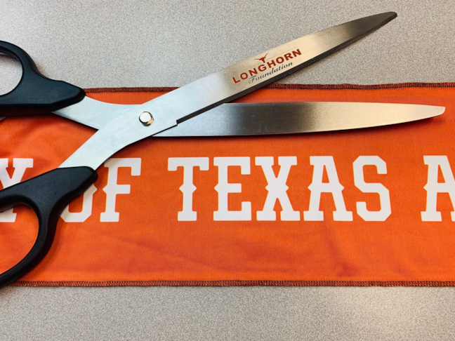 Giant Scissors and Grand Opening Banner