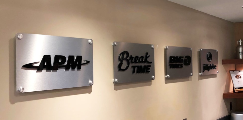 Using brushed metal and acrylic lettering Image360 Columbia MO created dimensional signs for MFA Oil that add to the professional atomosphere within the company.