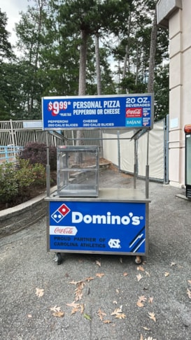 Vinyl graphics on a pizza booth at UNC