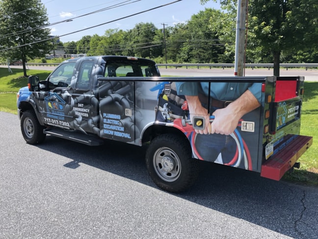 D. Baker Services full vehicle wrap