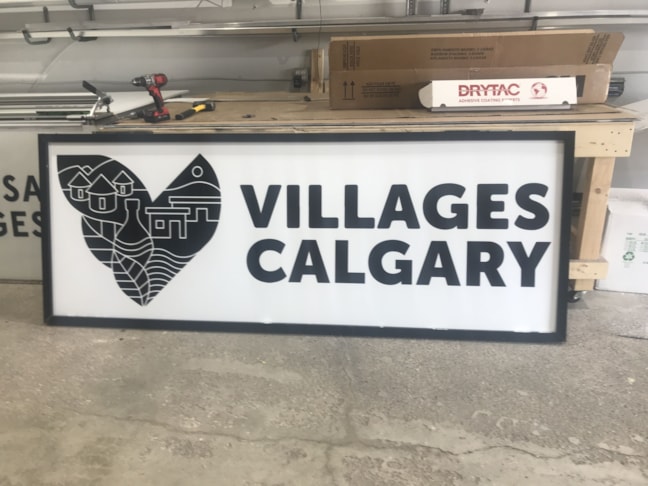 Lightbox Signs are extremely impactful and legible with a black and white background  and font colour combination 