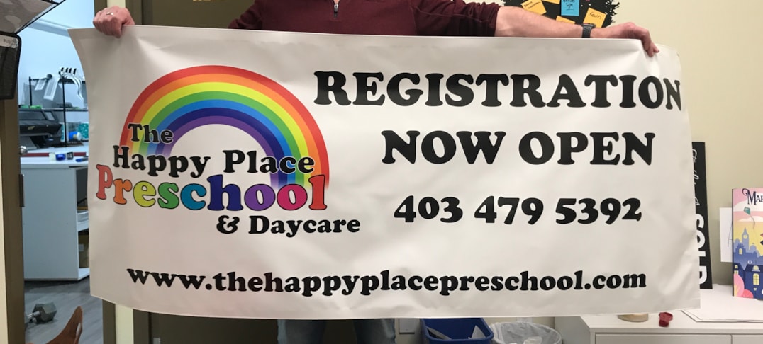 Fabric & Vinyl Outdoor Banners - This colourful logo looks great on this Grand Opening banner