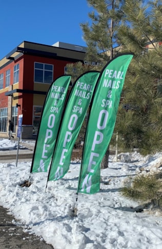 Tell your customers that you are OPEN with Flutter Flags & Feather Banners 