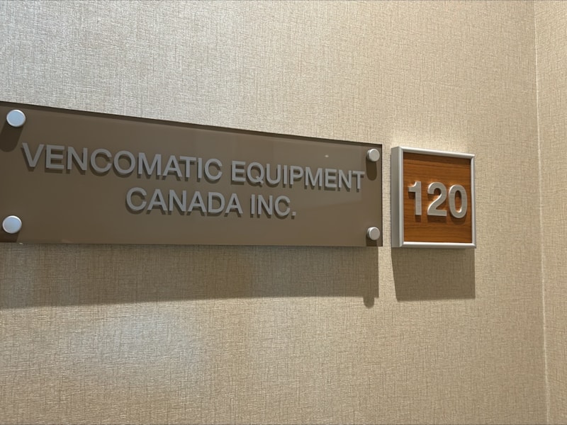 Badges & Name Plates | Manufacturing | Calgary, Alberta | Acrylic | Office wall sign for Vencomatic Equipment Canada Inc. with room number 120