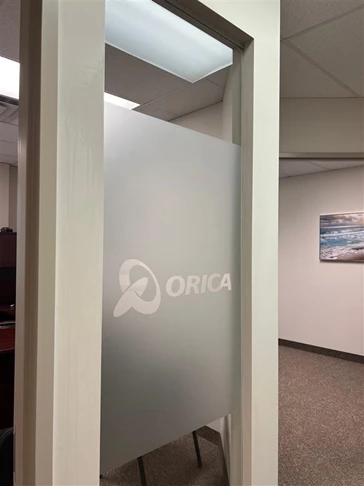 Frosted window graphics with your company logo creates office privacy