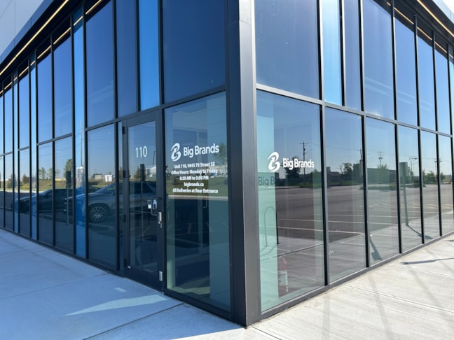 Window Graphics -- Bold, clean, and customer-friendly ?? We installed these window and door graphics for Big Brands to showcase their logo, hours, and contact info — keeping their storefront sharp and professional.