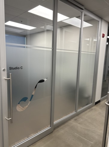Peek inside? Nah, let’s make them stop and stare with custom window graphics!