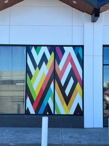 Window Graphics brighten up the entrance to your retail store.