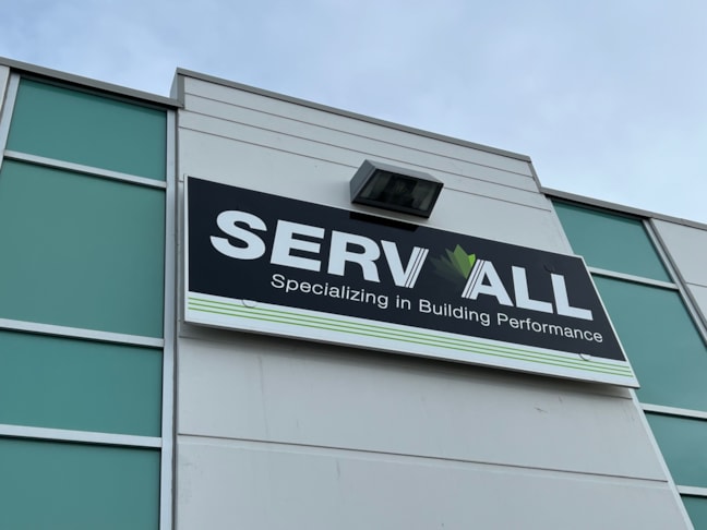 Mega sized yet simple outdoor building signage is most impactful 
