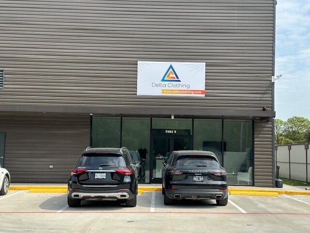 Banner for new location for Delta Clothing