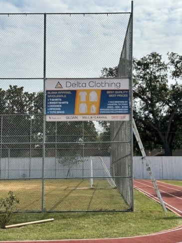 Outdoor banners advertising products for Delta Clothing