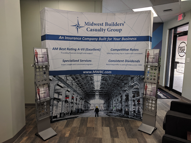 Curved Fabric Backdrop and Literature Racks for Midwest Builders Casualty in Kansas City, Missouri