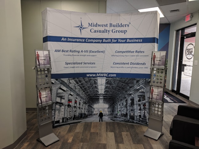 Curved Fabric Backdrop and Literature Racks for Midwest Builders Casualty in Kansas City, Missouri