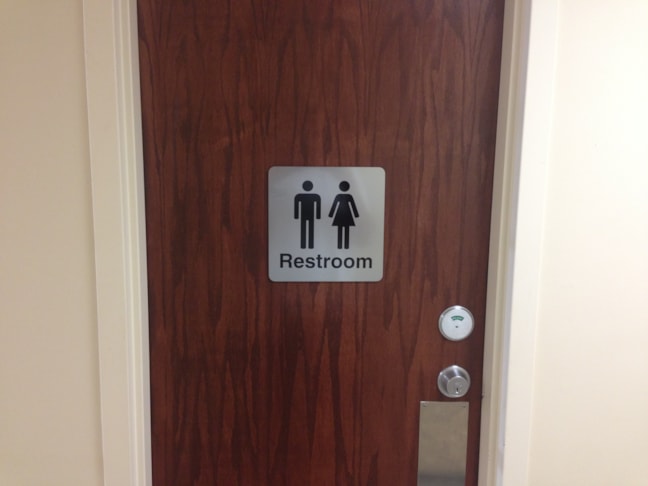 ADA Restroom Signs for Metropolitan Community College in Kansas City, MO