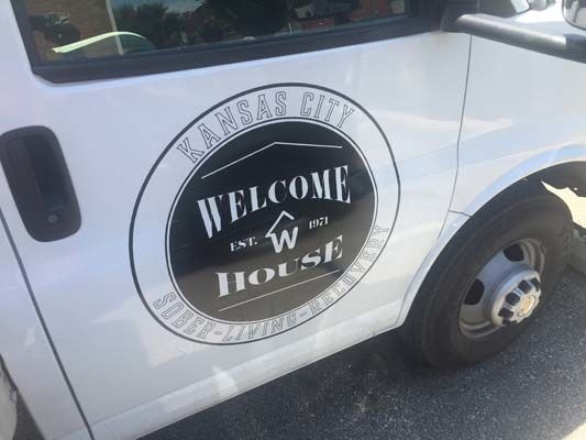 Cut Vinyl Door Decals for Welcome House in Kansas City, Missouri