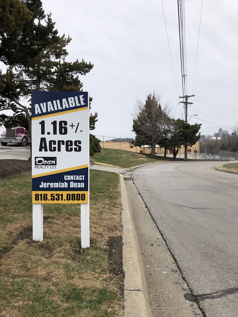 Exterior Wood Post and Panel Sign for Dean Realty in Kansas City, Kansas