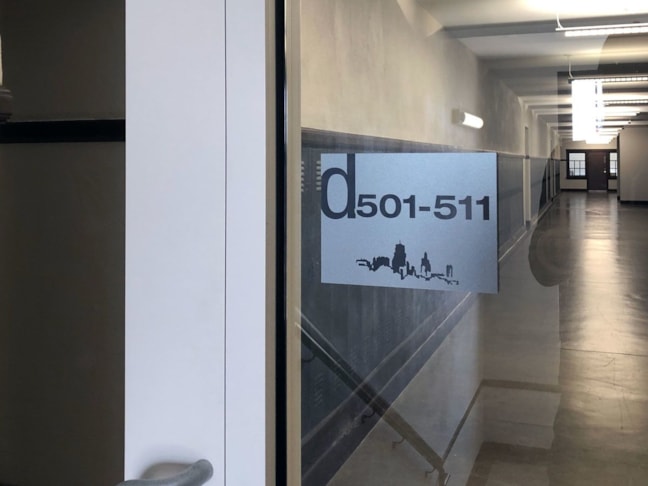 Frosted Acrylic Wayfinding Sign for Switzer Lofts in Kansas City, Missouri