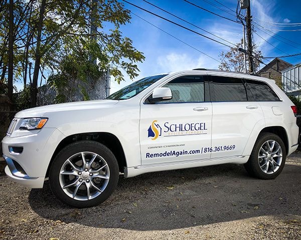 Full Color Vinyl Vehicle Door Decal for Jeep SUV for Schloegel Redesign in Kansas City, Missouri