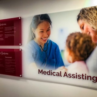 Interior Acrylic Sign with Standoffs for Concorde Career College in Kansas City, Missouri