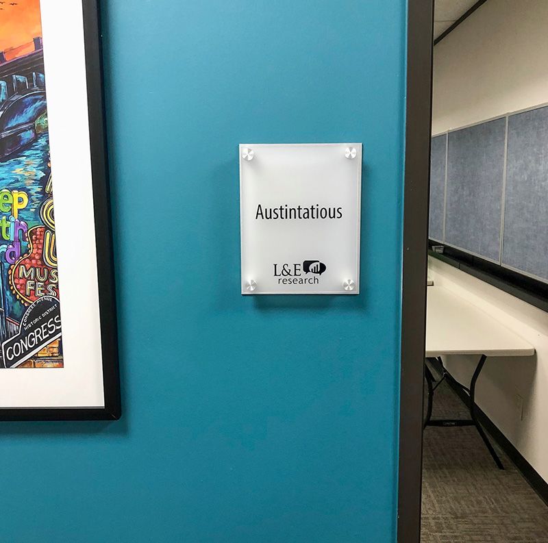 Interior Layered Acrylic and Brushed Metal Sign with Standoffs for L&E Research in Austin, Texas