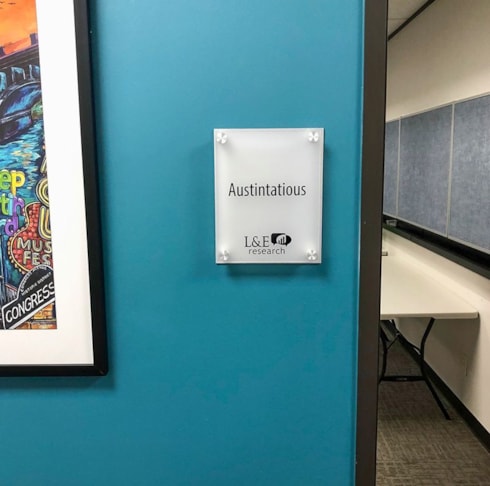 Interior Layered Acrylic and Brushed Metal Sign with Standoffs for L&E Research in Austin, Texas