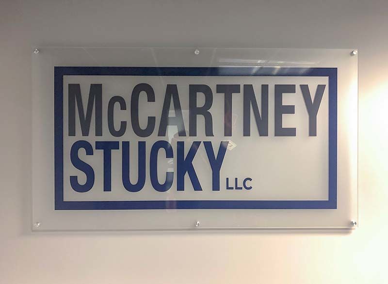 Interior Frosted Acrylic with Vinyl Logo and Standoffs for McCartney Stucky LLC in Kansas City, Missouri