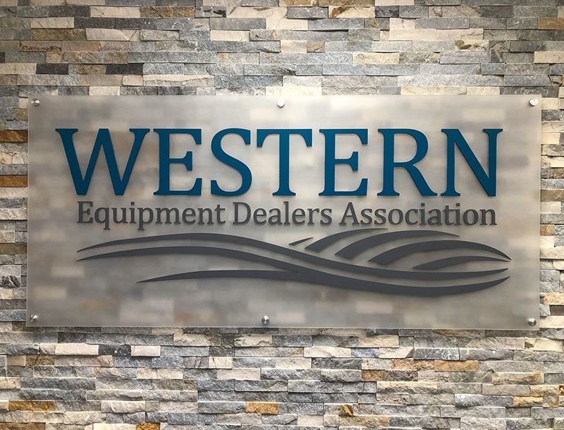 Interior Frosted Acrylic with Custom Painted Dimensional Logo and Letters for Western Equipment Dealers Association in Kansas City, Missouri