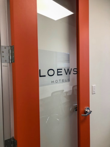 Cut Black Vinyl Door Logo for Novel Coworking in Kansas City, Missouri