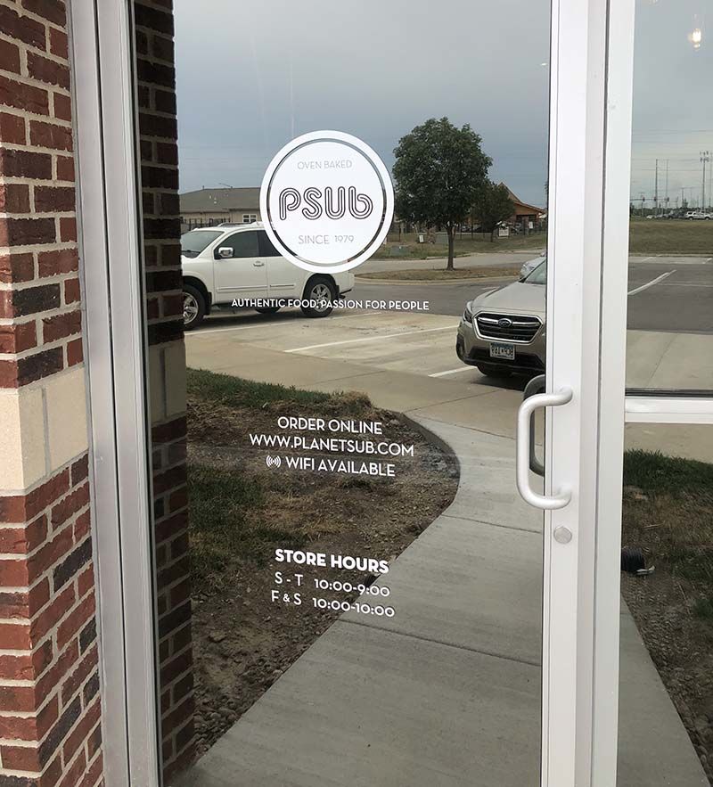 Exterior Cut White Vinyl Door Graphics for Planet Sub in Gardner, Kansas