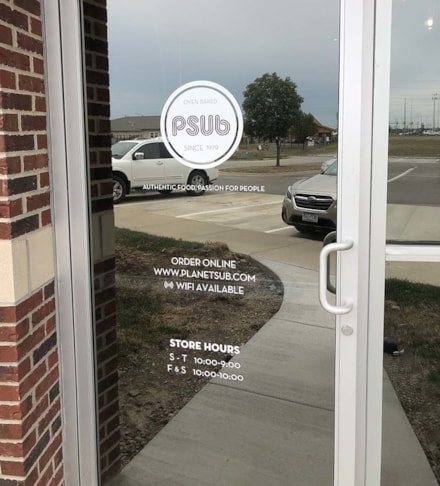 Exterior Cut White Vinyl Door Graphics for Planet Sub in Gardner, Kansas
